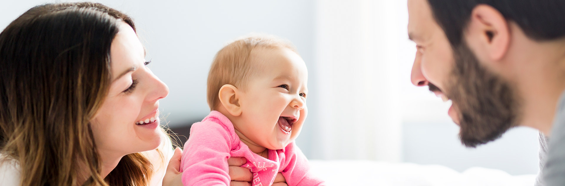 couple with a happy baby