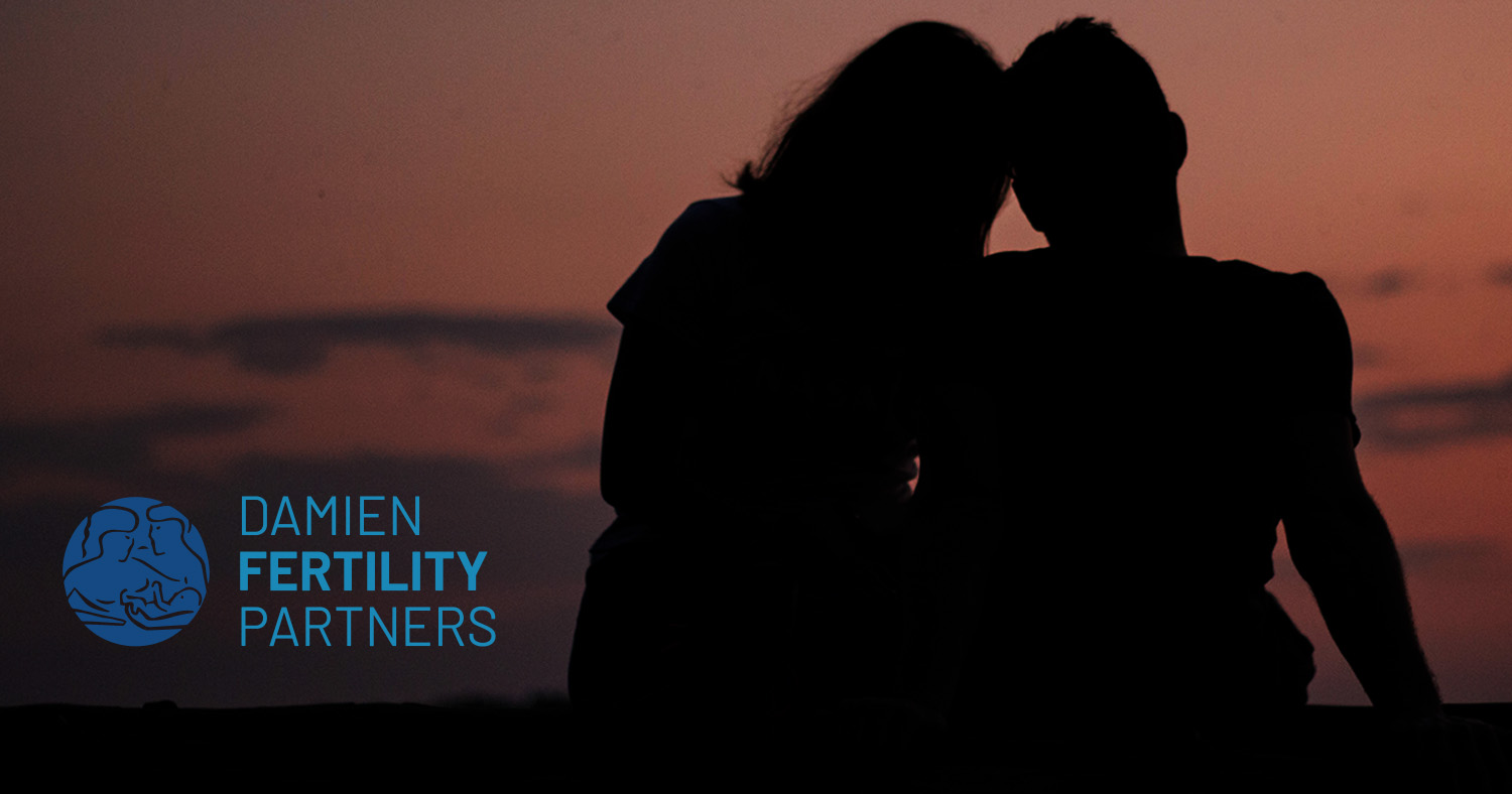 Silohuette of couple watching sunset | Damien Fertility Partners